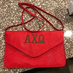 Simple AXO handbag. Crossbody or wristlet ❤️💚